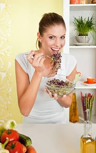 A veggie devotee enjoying a bowl of sprouts