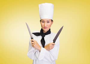 chef holding knives, girl