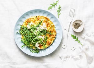 Summer squash frittata with goat cheese and arugula