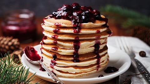 white wheat oatmeal pancakes with blueberries