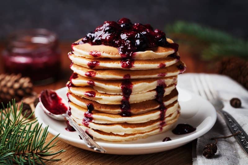 white wheat oatmeal pancakes with blueberries